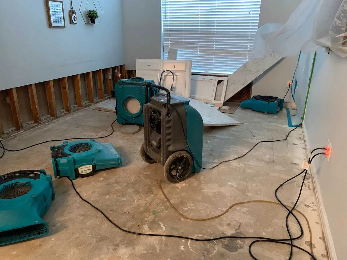 Dehumidifier in flood-cut room for Water Damage Restoration in Newington